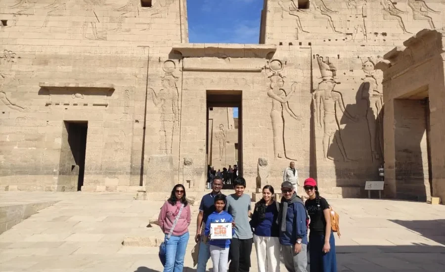 Travelers visiting Philae Temple during the 5 Days Cairo, Luxor and Alexandria Tour Package