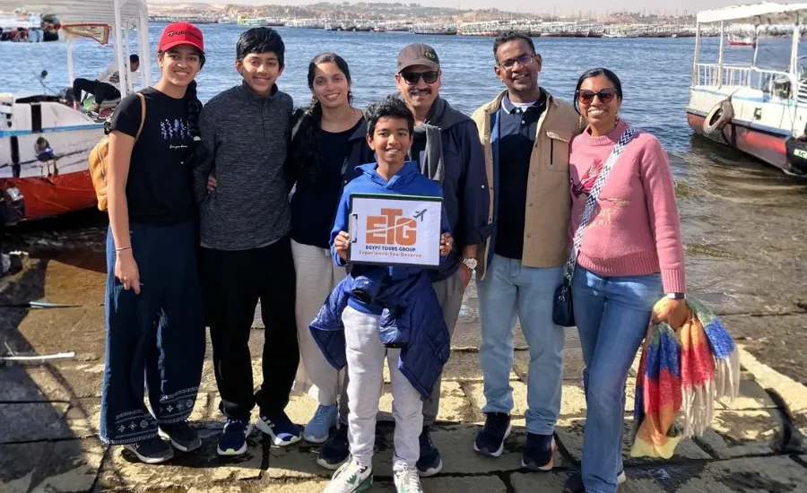 Family travelers by the Nile during 5 Days Luxor, Aswan & Abu Simbel Nile Cruise with Egypt Tours Group