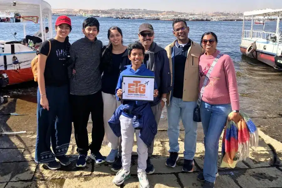 Family travelers by the Nile during 5 Days Luxor, Aswan & Abu Simbel Nile Cruise with Egypt Tours Group