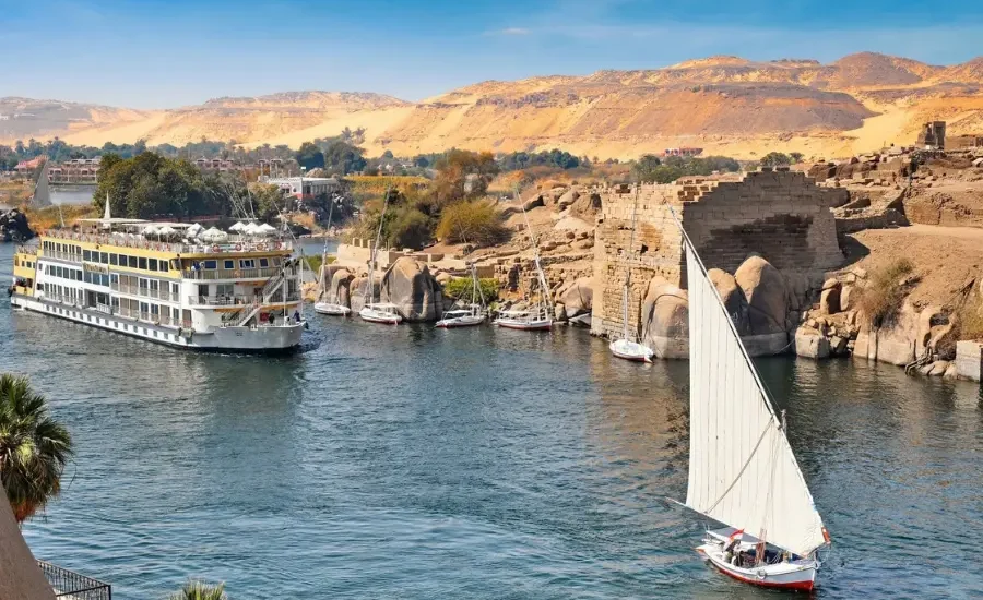 Nile cruise boat sailing in Aswan during the 6 Days Cairo Nile Cruise Tour