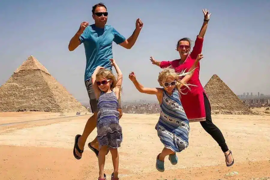 A family having fun beside the pyramids in Egypt - Egypt with Kids: The Ultimate Family Travel Guide (2026)- Egypt Tours Group