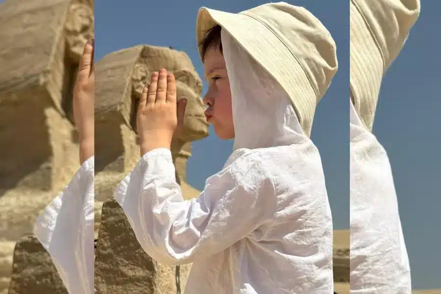 A kid tourist kisses the Sphinx - Egypt with Kids: The Ultimate Family Travel Guide (2026)- Egypt Tours Group