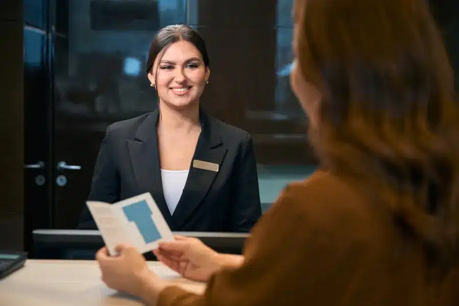 A receptionist helping a guest - Egypt Travel Cost 2026: How Much Does a Trip to Egypt Really Cost? - Egypt Tours Group