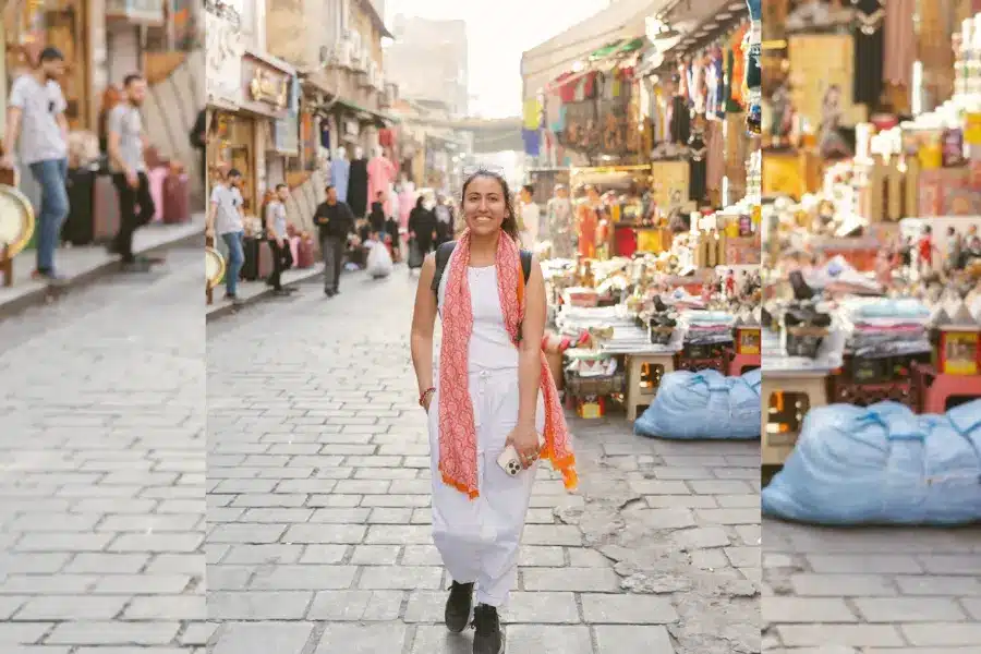 A solo female tourist at Khan Al Khalili- Solo Female Travel in Egypt: Is It Safe? What to Wear, Routes & Tips (2026) - Egypt Tours Group