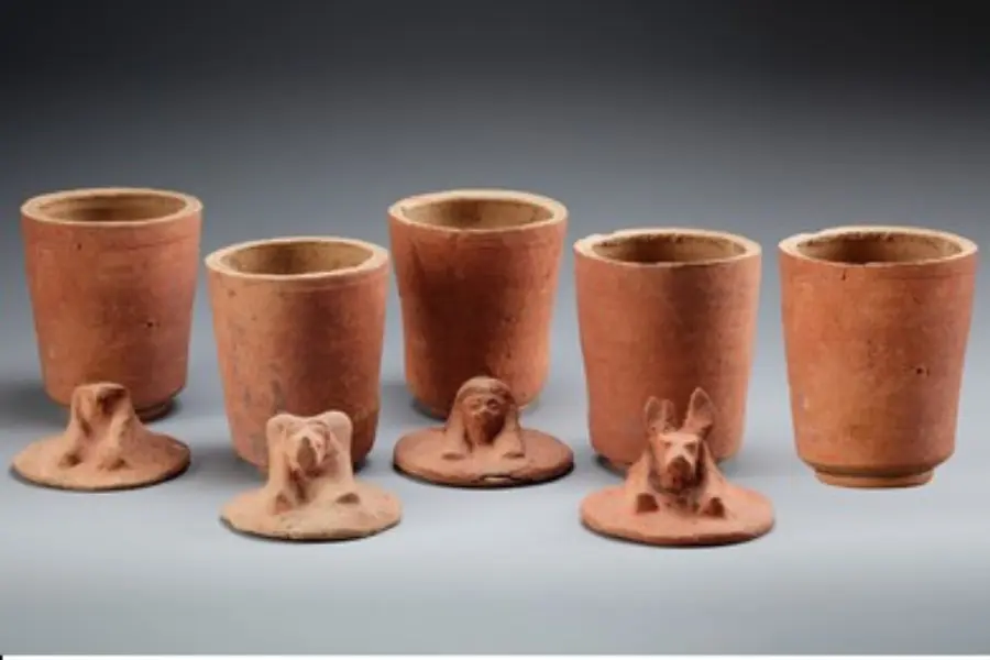 Egyptian canopic jars made of pottery with covers of the four sons of god Horus - Canopic Jars in Ancient Egypt: Meaning, Purpose, and the Four Sons of Horus - Egypt Tours Group
