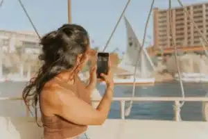 A woman enjoying a felucca ride on the Nile - Cairo Day Trips - Egypt Tours Group