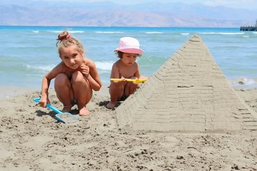 Kids playing by the sea in Egypt - Egypt with Kids: The Ultimate Family Travel Guide (2026) - Egypt Tours Group