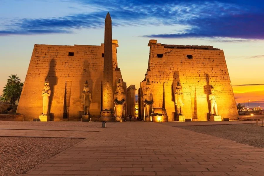 Luxor Temple illuminated at dusk