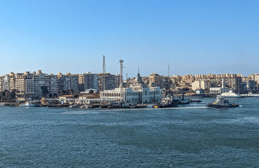 Port Said City's panoramic view with ships at the Suez Canal