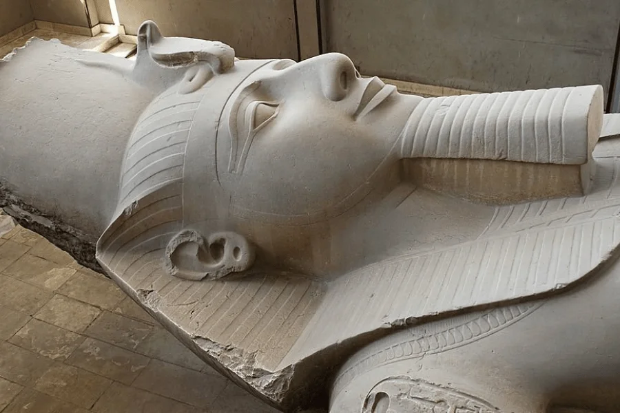 Colossal statue of King Ramses II at Mit Rahina open-air museum in Memphis Egypt