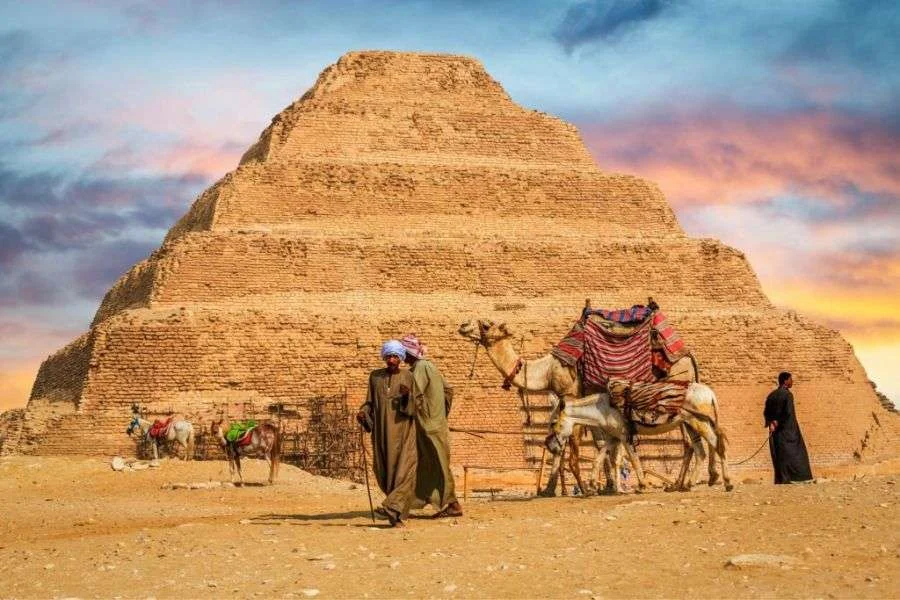visitors exploring the Saqqara Step Pyramid in Egypt
