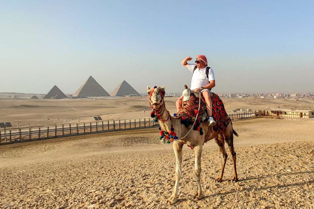 Camel ride at Giza Pyramids in Cairo Egypt