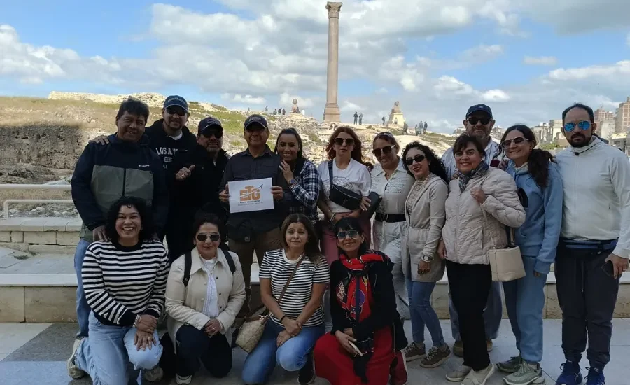Travelers visiting Pompey's Pillar in Alexandria during 9 Days Cairo, Alexandria & Sharm El Sheikh Holiday with Egypt Tours Group