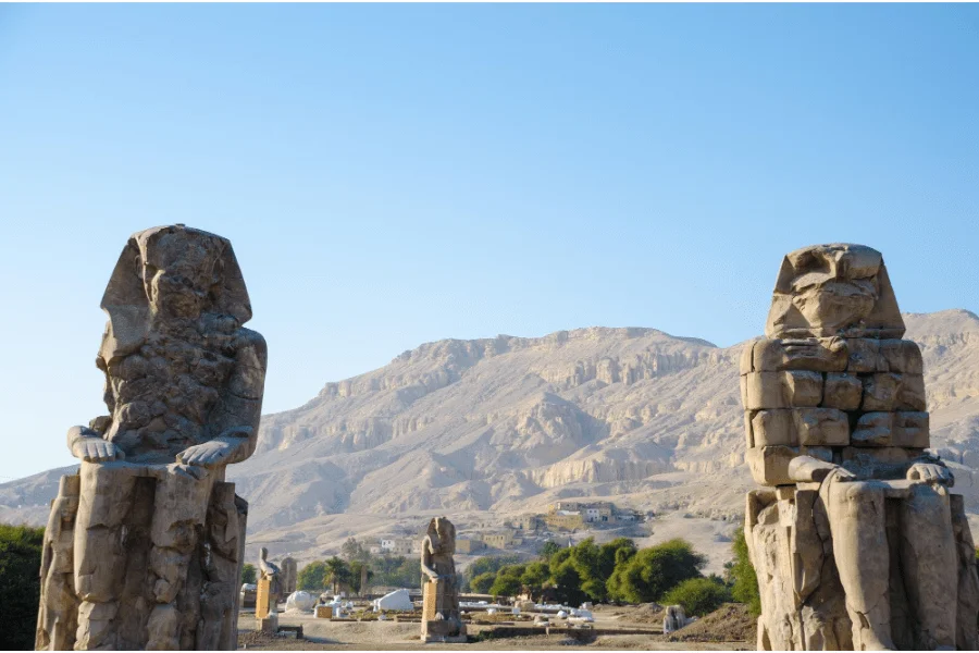 the awe-inspiring Colossi of Memnon, the monumental statues of ancient Egypt - 7 Days Cairo, Abu Simbel, Luxor & Bahariya Oasis Tour