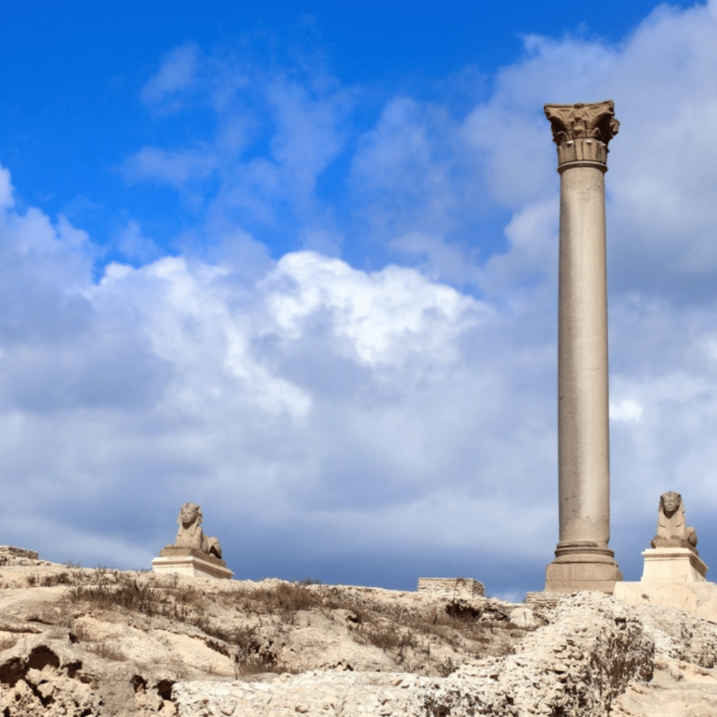 Pompey's Pillar, an ancient Roman column in Alexandria, exciting visit during our 8 Days Cairo, Alexandria, Alamein and Siwa Oasis Tour