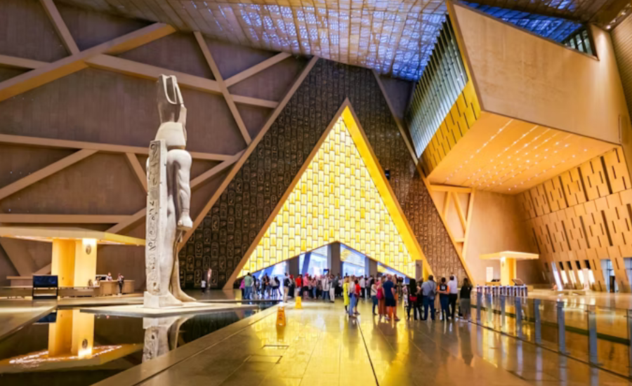 12 Days Cairo, Hurghada, Nile Cruise & Sahara - The Grand Egyptian Museum with ancient artifacts on display.