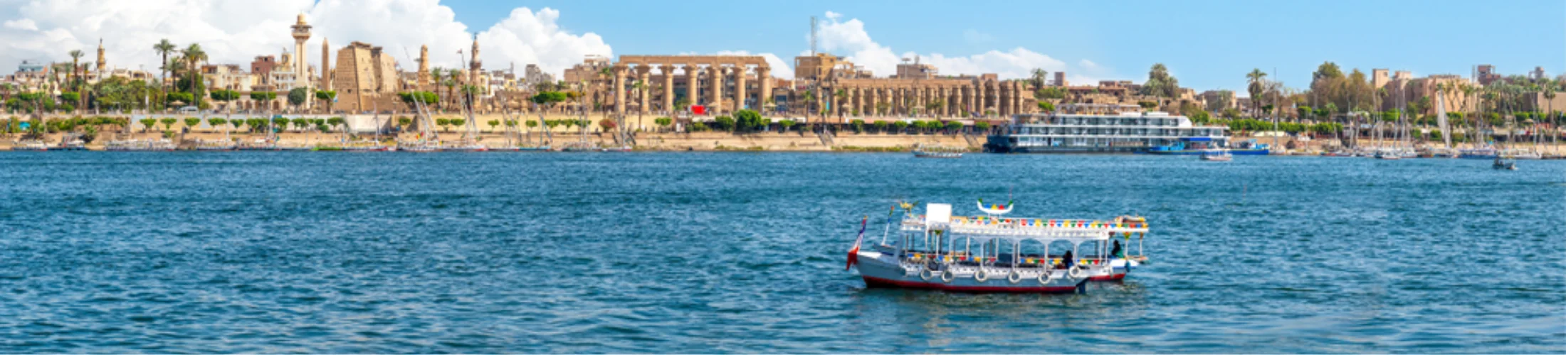 A luxurious Nile River Cruise ship sailing along the Nile, part of our 5 Days Nile Cruise from El Gouna to Luxor & Aswan