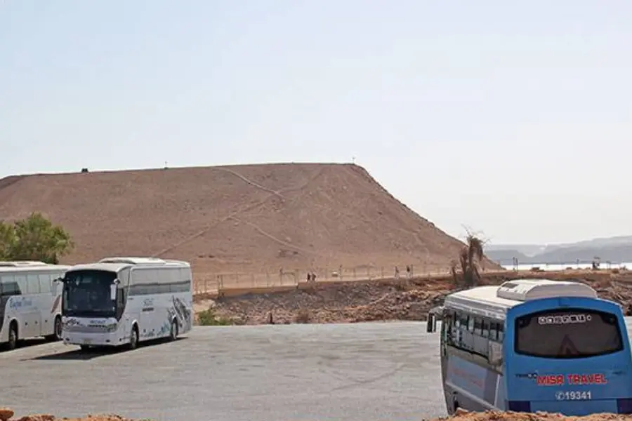Cairo to Aswan Train + Bus to Abu Simbel Tourist buses arriving at Abu Simbel Temples from Aswan