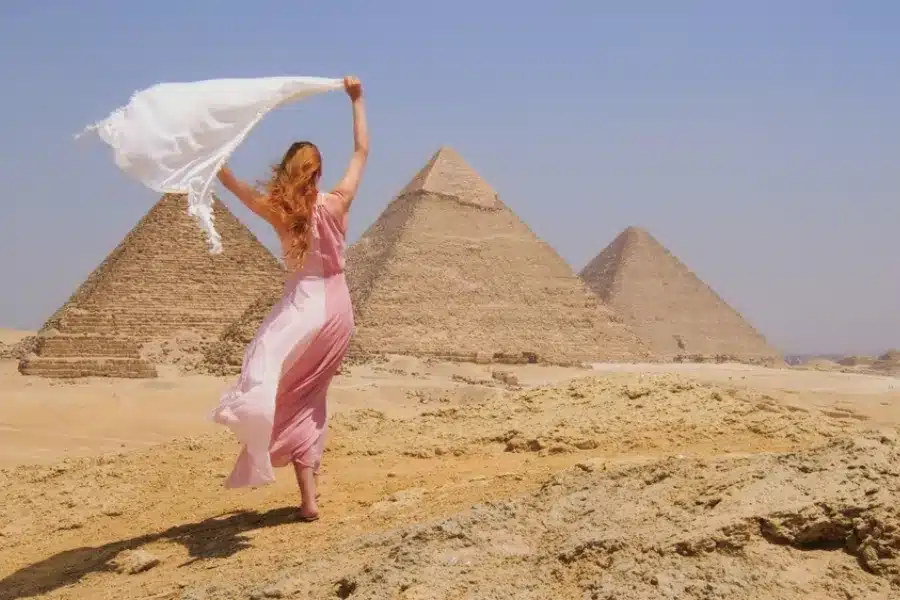 Where to Go in Egypt in 2026: Traveler enjoying the Pyramids of Giza, one of the best places to visit in Egypt
