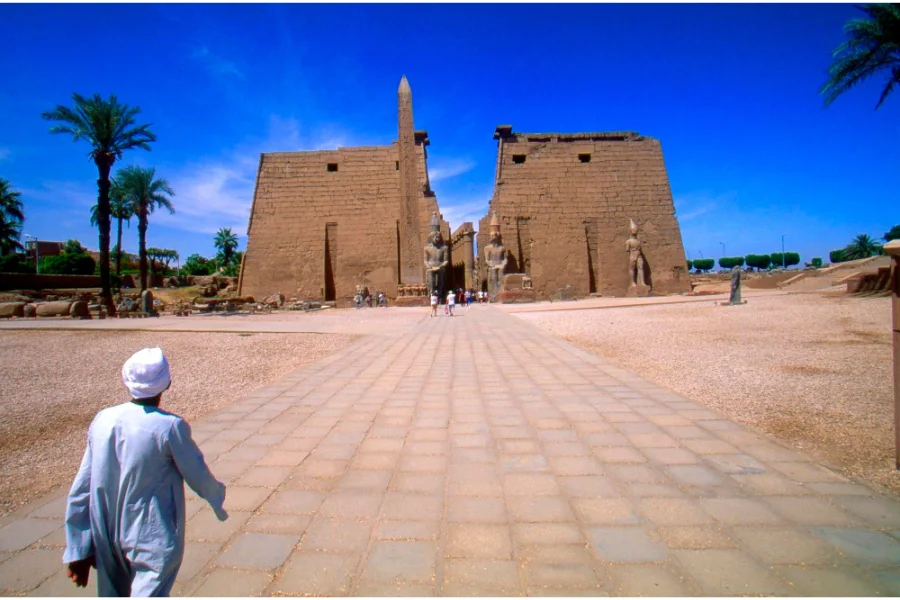 Stones of Luxor Temple glow with stories that never faded - 2 Days Luxor Tour from Cairo by Plane.