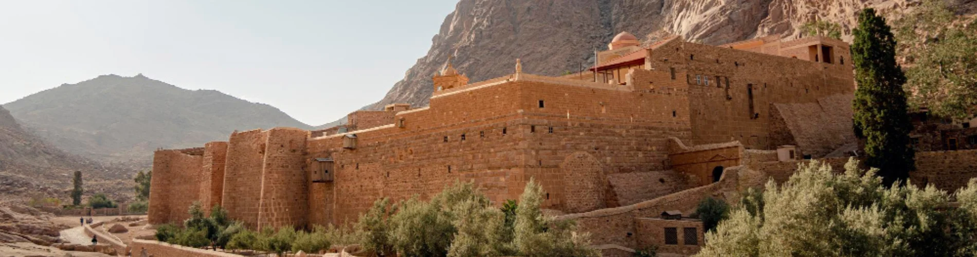 St. Catherine’s Monastery in Egypt, part of our Book a private 2-Day Mount Sinai & St Catherine Tour from Cairo with a sunrise hike, monastery visit, hotel stay, Bedouin guide, meals and transfers.