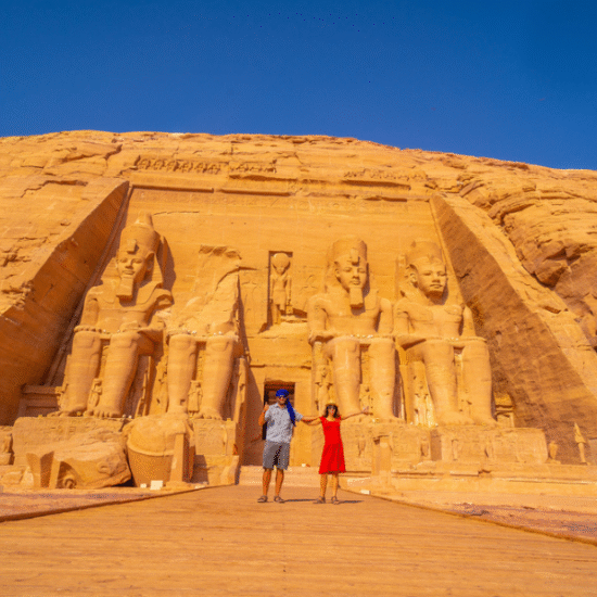 Sunlit facade of Abu Simbel with colossal statues of Ramses II - 8 Days Cairo, Nile Cruise & Abu Simbel Easter Holiday