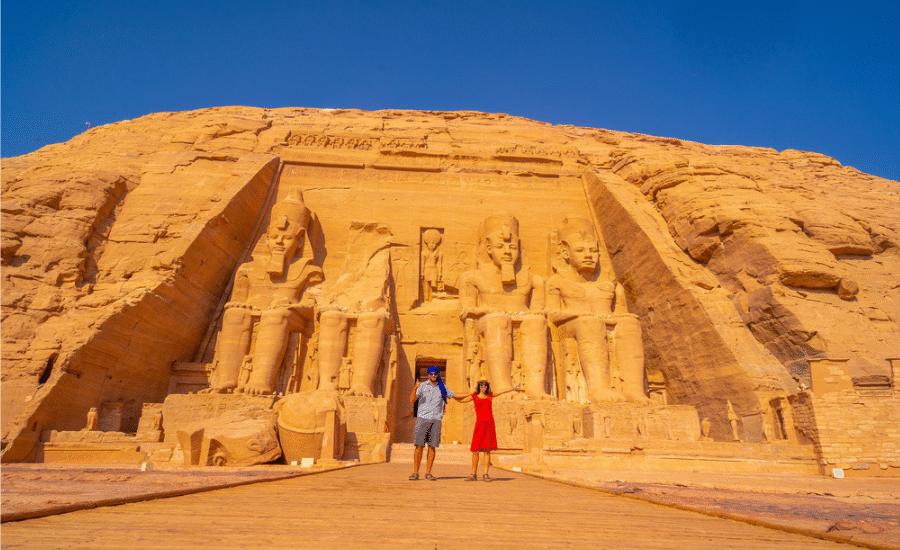 Sunlit facade of Abu Simbel with colossal statues of Ramses II - 8 Days Cairo, Nile Cruise & Abu Simbel Easter Holiday