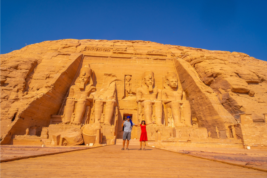 Sunlit facade of Abu Simbel with colossal statues of Ramses II - 8 Days Cairo, Nile Cruise & Abu Simbel Easter Holiday