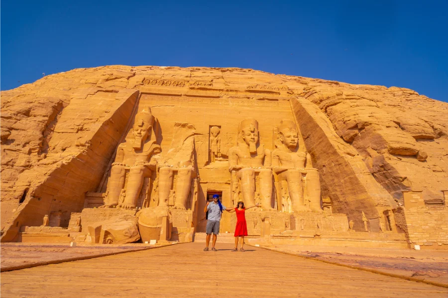 Sunlit facade of Abu Simbel with colossal statues of Ramses II - 8 Days Cairo, Nile Cruise & Abu Simbel Easter Holiday