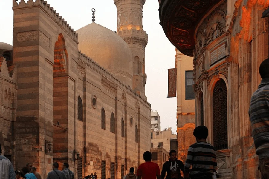 Historical architecture along El Moez Street at night