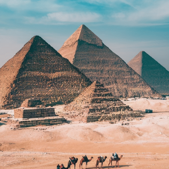Giza pyramids with the Sphinx under blue sky