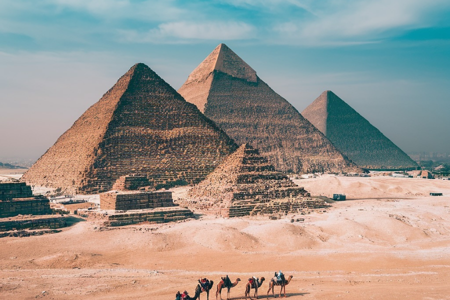 Giza pyramids with the Sphinx under blue sky