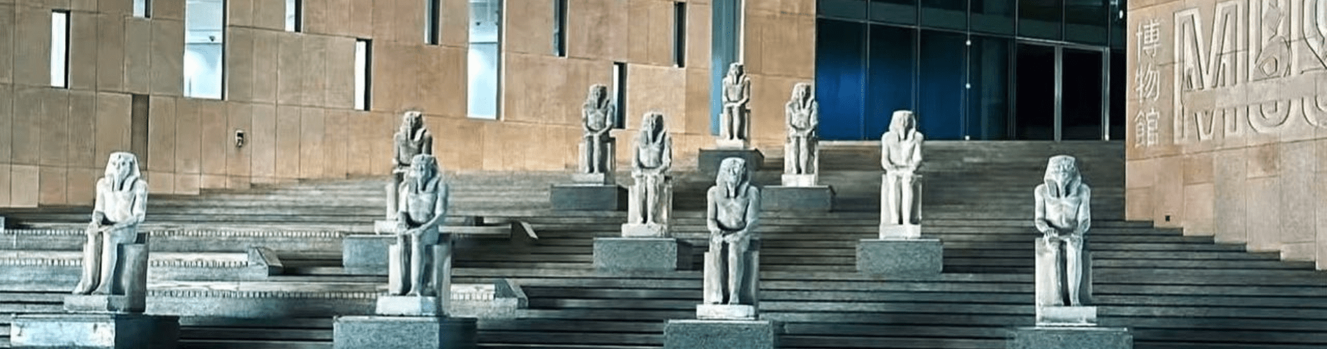 7 Days Cairo, Luxor, Aswan & Abu Simbel – Egypt Easter Tour - Modern façade of the Grand Egyptian Museum in Giza, Egypt