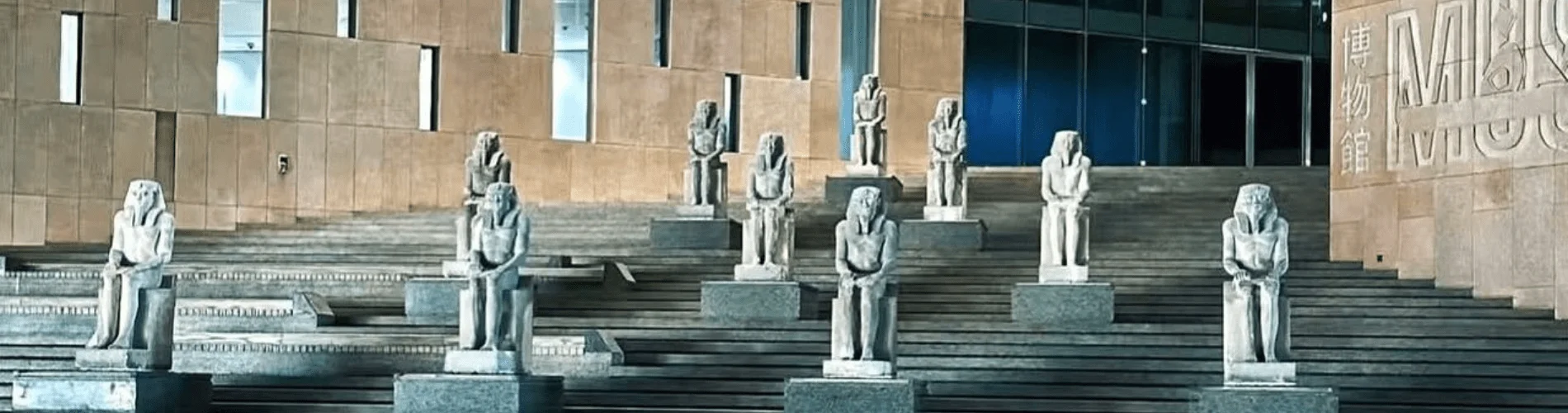 7 Days Cairo, Luxor, Aswan & Abu Simbel – Egypt Easter Tour - Modern façade of the Grand Egyptian Museum in Giza, Egypt
