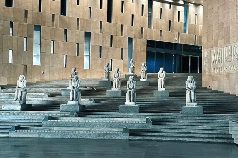 Modern façade of the Grand Egyptian Museum in Giza, Egypt