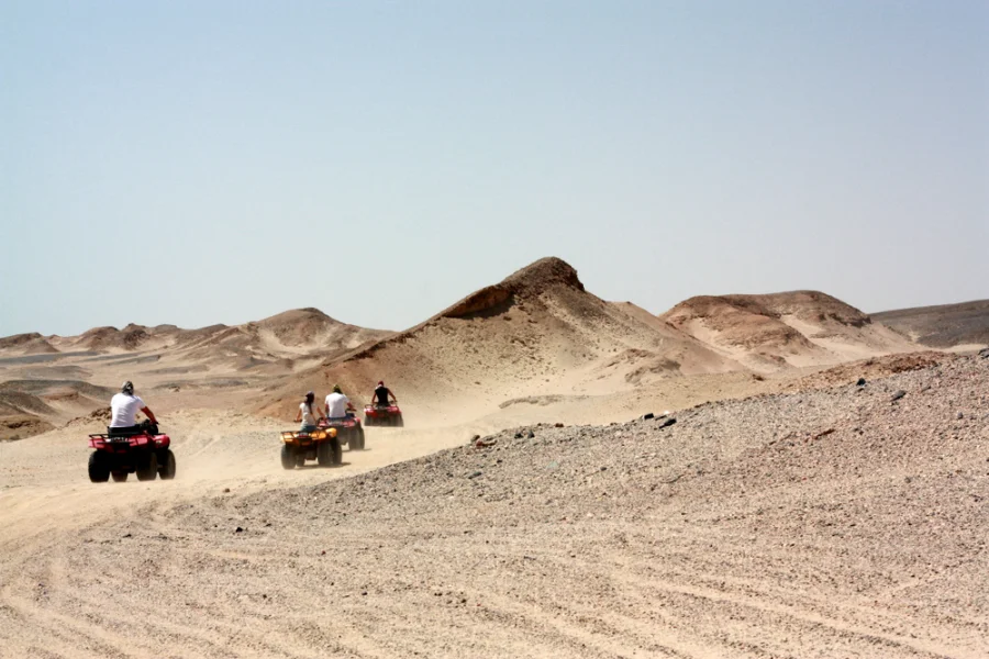 Traveler driving a beach buggy on a desert safari in Marsa Alam