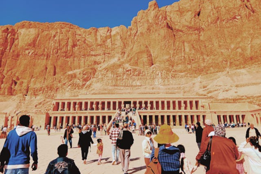 Traveler relaxing on Hurghada beach during Egypt tour - Best Hurghada Tours & Excursions 2025