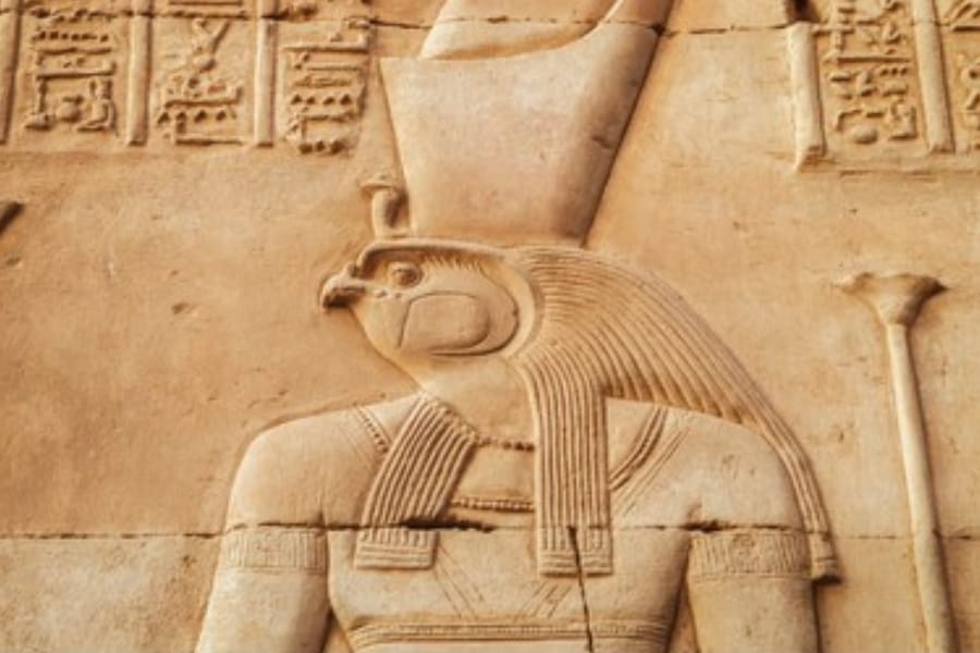 Horus statue — falcon-headed Egyptian god in temple courtyard