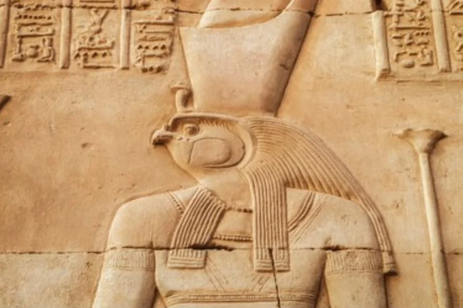 Horus statue — falcon-headed Egyptian god in temple courtyard