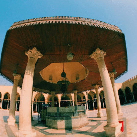 Morning sunlight shining through the arches of Amr Ibn Al-As Mosque in Old Cairo