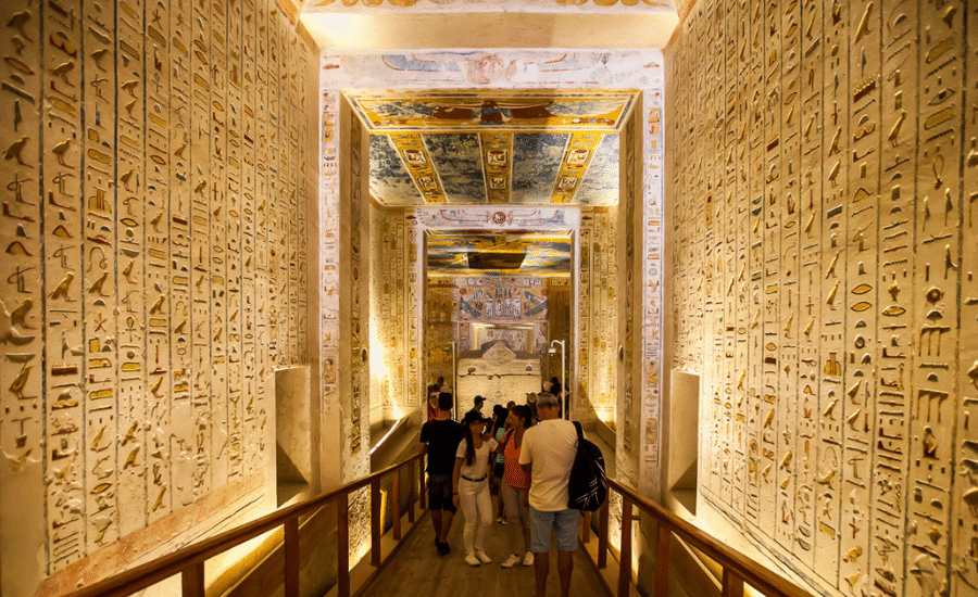 Sunrise over the Valley of the Kings with tomb entrances set in the golden desert hills
