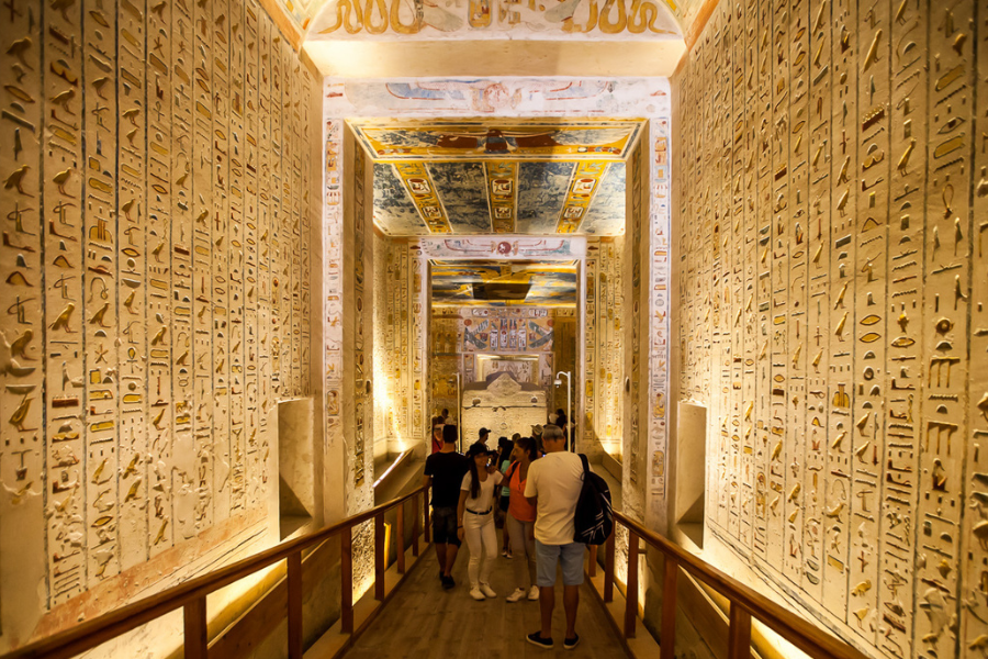 Sunrise over the Valley of the Kings with tomb entrances set in the golden desert hills