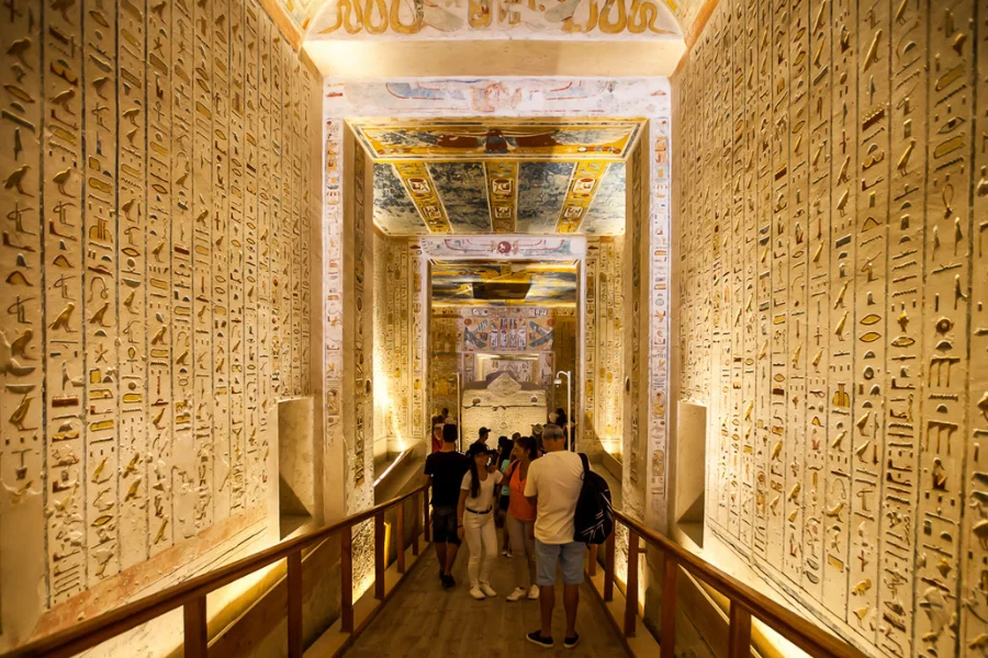 Sunrise over the Valley of the Kings with tomb entrances set in the golden desert hills