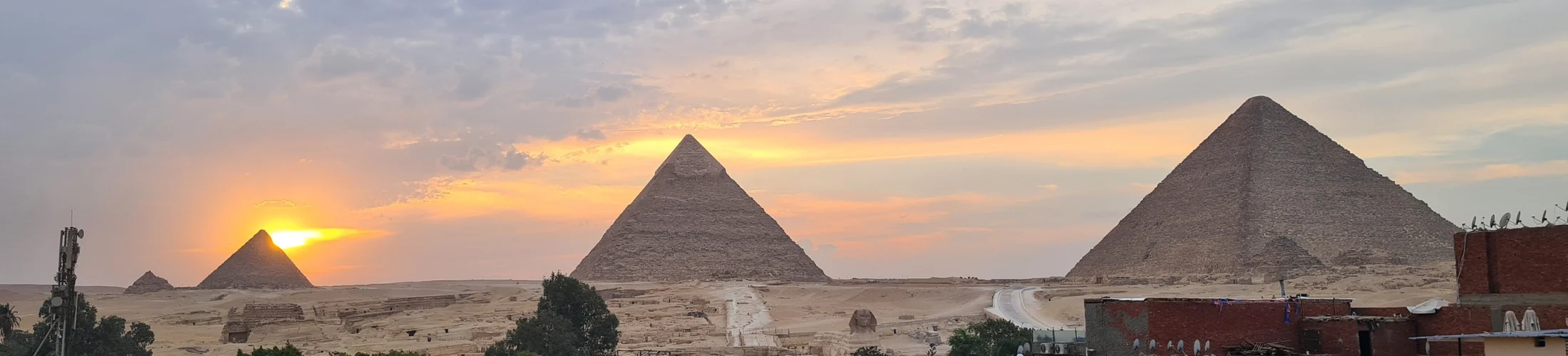 Pyramids of Giza at sunset