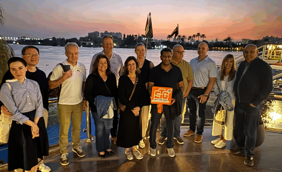 Tourists enjoying a relaxing evening on a Nile cruise after dinner.