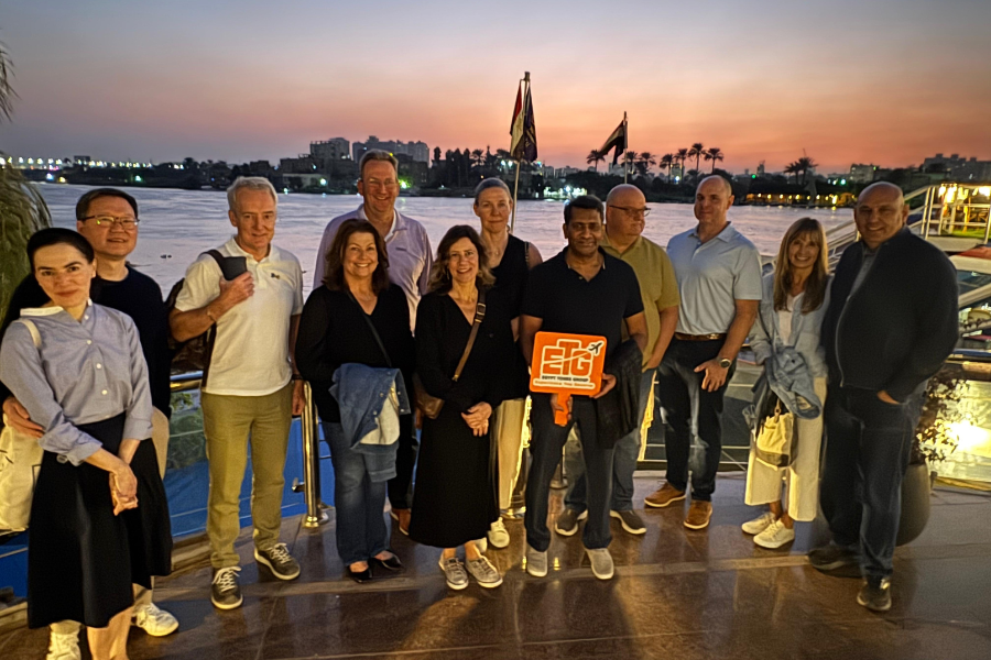 Tourists enjoying a relaxing evening on a Nile cruise after dinner.