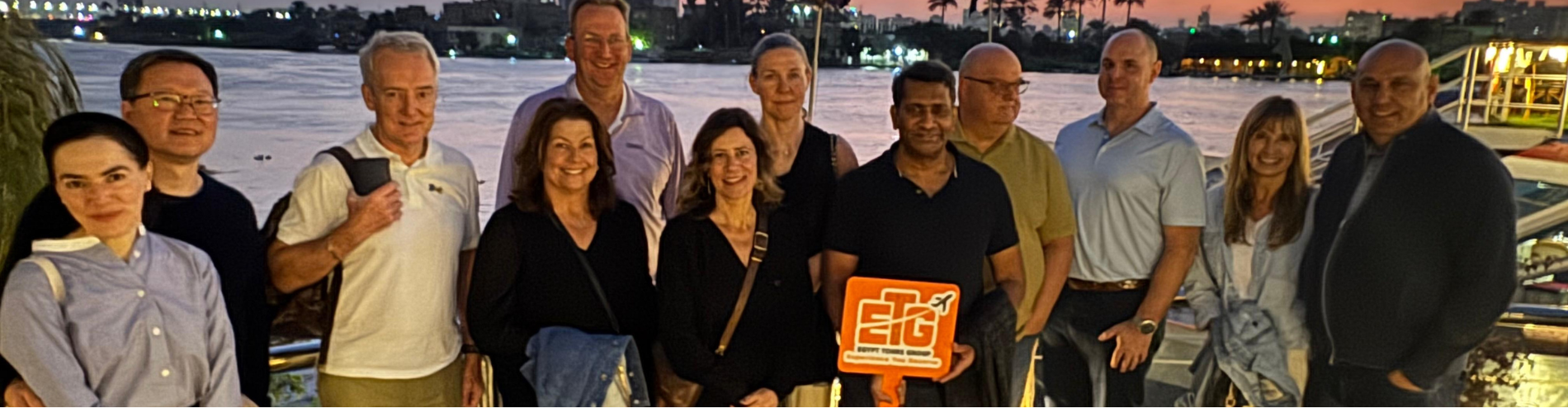 Tourists enjoying a relaxing evening on a Nile cruise during our 4 days Cairo and Luxor Budget Tour