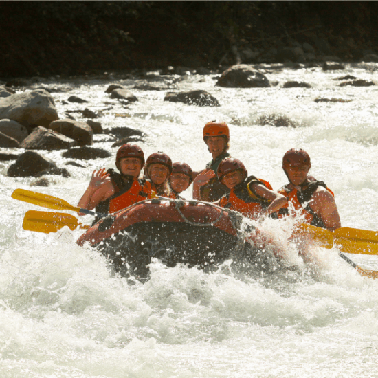 Family enjoying water sports in the Red Sea during a private Egypt beach vacation.