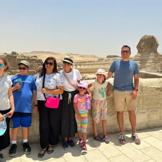 Family visiting the Pyramids of Giza, Cairo Egypt