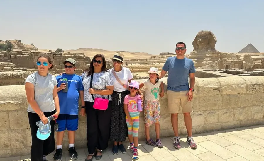 Family visiting the Pyramids of Giza, Cairo Egypt